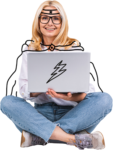 Woman sitting in front of laptop with superhero drawings